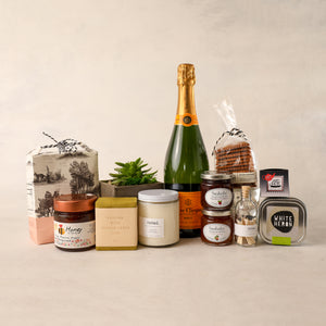 For the Home Gift Box by Jardiniere Flowers Luxe Veuve Cliqucot champagne succulent Noted. Candles Saipua soap honey tea jam Sarabeth's NYC Persephone Bakery cookie and granola family-owned florist Portsmouth New Hampshire celebrate love gifts wine flora Maine New Hampshire Seacoast of New England Local Delivery Order Online